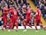 Liverpool's Sadio Mane celebrates scoring their first goal with teammates on October 16, 2021