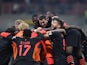 AC Milan's Koray Gunter celebrates scoring their third goal with teammates on October 16, 2021