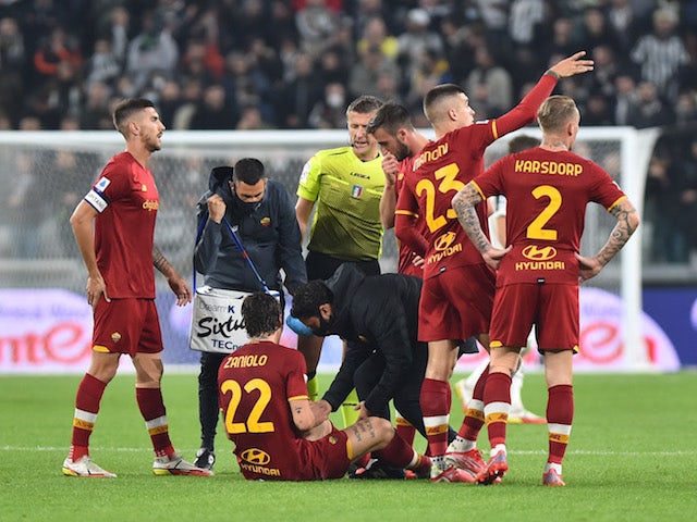 Roma's Nicolo Zaniolo receives medical attention after sustaining an injury on October 17, 2021
