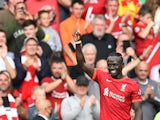 Liverpool's Sadio Mane celebrates scoring their first goal on September 18, 2021