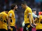 Wolverhampton Wanderers' Conor Coady celebrates scoring their second goal with Ruben Neves on October 16, 2021