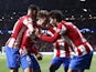 Atletico Madrid's Antoine Griezmann celebrates scoring their second goal with teammates on October 19, 2021