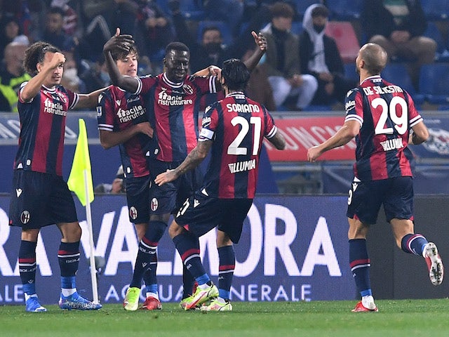 Bologna's Musa Barrow celebrates scoring their second goal with teammates on October 23, 2021
