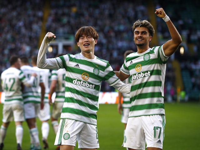 Celtic's Kyogo Furuhashi celebrates scoring their first goal with Jota on October 19, 2021