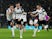 Derby County's Tom Lawrence celebrates scoring their first goal with teammates on October 19, 2021