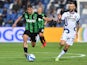 Sassuolo's Filip Duricic in action with Inter Milan's Marcelo Brozovic on October 2, 2021