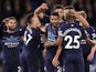 Manchester City's Riyad Mahrez celebrates scoring their fourth goal with teammates on October 23, 2021