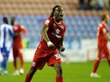 MK Dons' Peter Kioso celebrates after the match on October 19, 2021