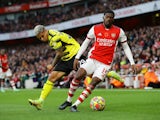  Arsenal's Ainsley Maitland-Niles in action with Watford's Cucho Hernandez in November 2021