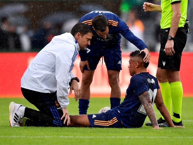 Real Madrid's Mariano Diaz receives medical attention after sustaining an injury on October 30, 2021
