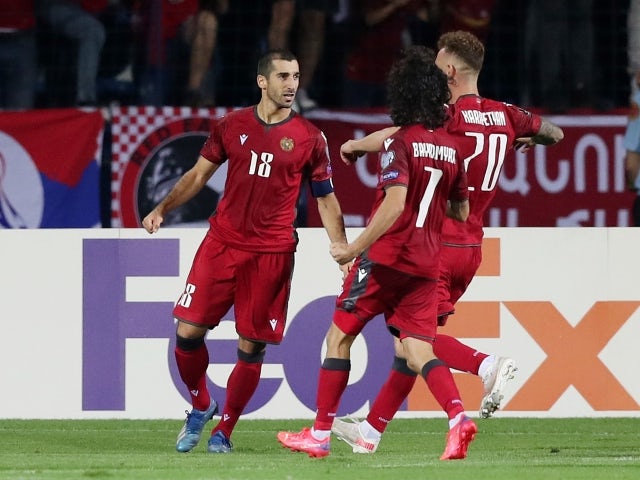Armenia's Henrikh Mkhitaryan celebrates with his teammates on 8 September 2021