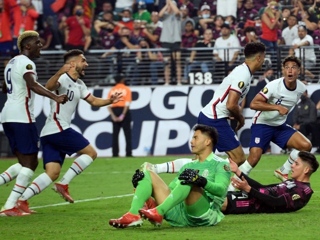 USA players celebrate scoring against Mexico in the CONCACAF Gold Cup final on August 1, 2021