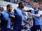 Wycombe Wanderers' Brandon Hanlan celebrates after scoring their second goal with teammates on October 9, 2021