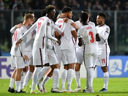 England's Tyrone Mings celebrates scoring their eighth goal against San Marino on November 15, 2021