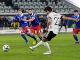 Germany's Ilkay Gundogan scores from the penalty spot against Liechtenstein on November 11, 2021