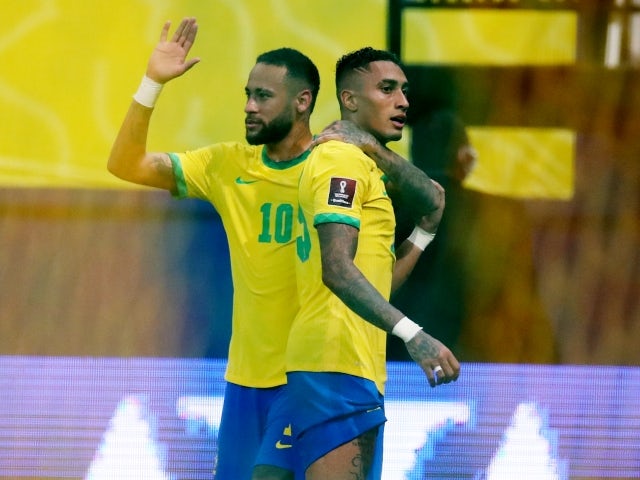 Brazil's Raphinha celebrates with Neymar on October 14, 2021