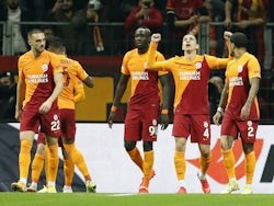Galatasaray's Taylan Antalyali celebrates their second goal with teammates on November 25, 2021