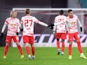 RB Leipzig's Andre Silva celebrates scoring their first goal with Konrad Laimer on November 28, 2021