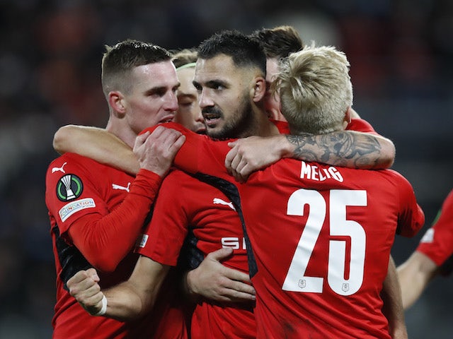 Stade Rennes' Gaetan Laborde celebrates scoring their second goal with teammates on November 25, 2021