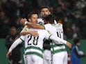 Sporting Lisbon's Paulinho celebrates scoring their second goal with teammates on November 28, 2021