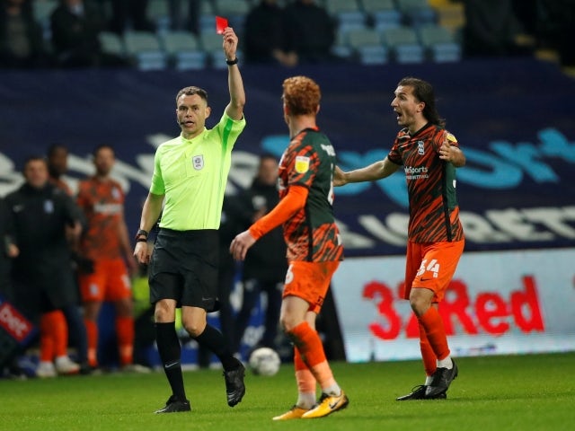 Birmingham City's Ryan Woods is shown a red card by the referee on November 23, 2021