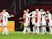 Ajax's Steven Berghuis celebrates scoring their fourth goal with teammates on December 7, 2021