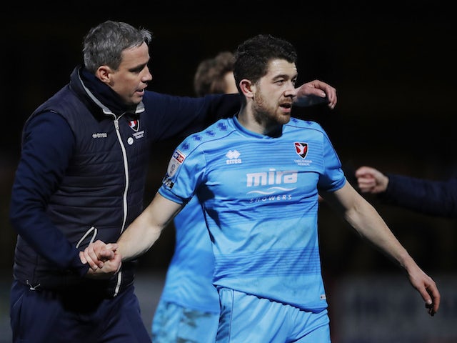 Cheltenham Town's manager Michael Duff and Sean Long after the match in February 2021