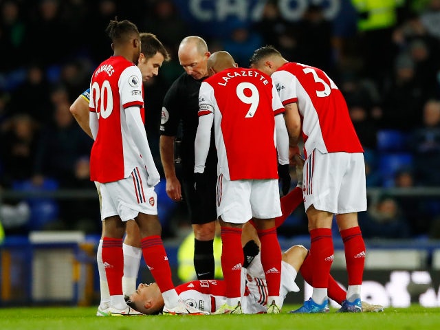 Gabriel Martinelli goes down injured for Arsenal against Everton on December 6, 2021