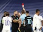 Inter Milan's Nicolo Barella is shown a red card by referee Felix Brych on December 7, 2021