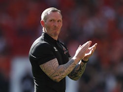 Lincoln City manager Michael Appleton looks dejected as he applauds fans after the match in May 202