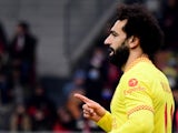 Liverpool's Mohamed Salah celebrates scoring their first goal on December 7, 2021