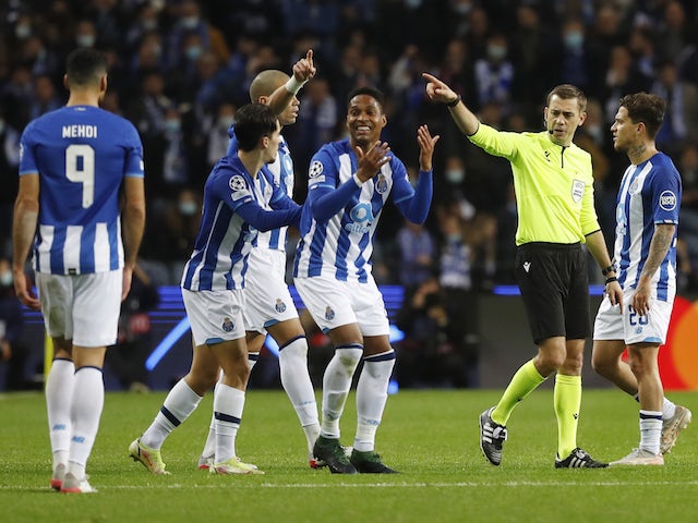 Porto's Wendell reacts after being shown a red card by referee Clement Turpin on December 7, 2021
