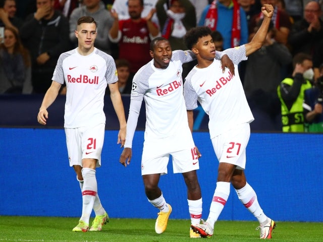 Red Bull Salzburg's Karim Adeyemi celebrates scoring with teammates Mohamed Camara and Luka Sucic on October 20, 2021