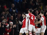 Arsenal's Gabriel Martinelli celebrates scoring their first goal with teammates on December 15, 2021
