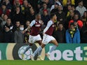 Aston Villa's Jacob Ramsey celebrates scoring their first goal with Ashley Young on December 14, 2021