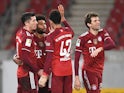 Bayern Munich's Serge Gnabry celebrates scoring their fifth goal with teammates on December 14, 2021