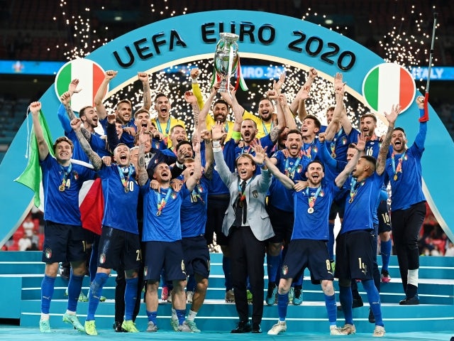 Euro 2020 winners Italy celebrate with the trophy on July 11, 2021