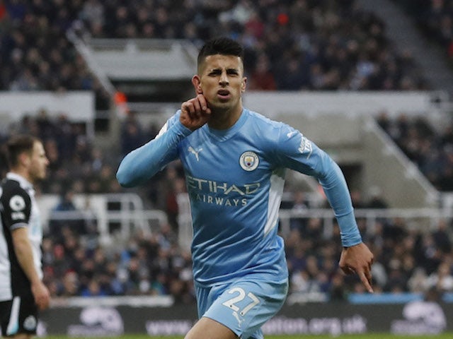 Man City's Joao Cancelo signs two-year contract extension