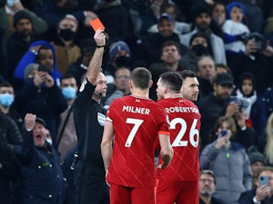 Ten-man Liverpool drop points in Tottenham thriller