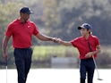 Tiger Woods and Charlie Woods at the PNC Championship on December 19, 2021.