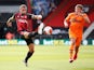 Newcastle United's Dwight Gayle in action with Bournemouth's Steve Cook, July 1, 2020