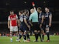 West Ham United's Vladimir Coufal is shown a red card by referee Anthony Taylor after conceding a penalty against Arsenal's Alexandre Lacazette on December 15, 2021