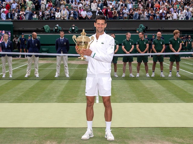 Novak Djokovic with the Wimbledon trophy in July 2021
