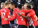 Southampton's James Ward-Prowse celebrates scoring their first goal with teammates on December 28, 2021