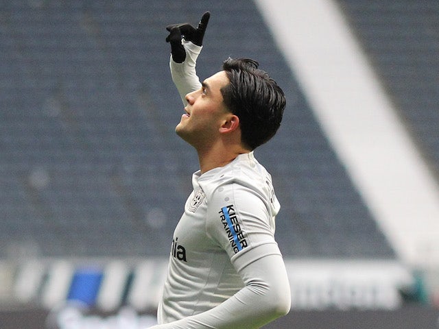 Bayer Leverkusen's Nadiem Amiri celebrates scoring their first goal on January 2, 2021