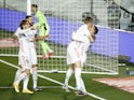 Real Madrid's Lucas Vazquez celebrates scoring their first goal with teammates against Celta Vigo on January 2, 2021