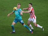 Stoke City's James Chester in action with Bournemouth's Sam Surridge in the Championship on January 2, 2021