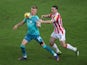 Stoke City's James Chester in action with Bournemouth's Sam Surridge in the Championship on January 2, 2021