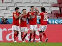 Benfica's Alejandro Grimaldo celebrates scoring their second goal with teammates on January 9, 2022