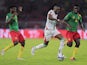 Burkina Faso's Bertrand Traore in action with Cameroon's Samuel Gouet Oum on January 9, 2022